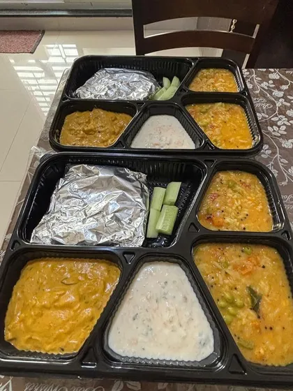 I create special, mild, and nutritious meal boxes for kids' parties. This one includes soft roti, a simple paneer gravy, and comforting bisibelebath, ensuring even the little ones enjoy a tasty and wholesome meal.
