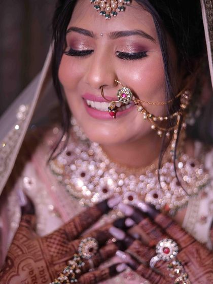 A collection of portraits showing this bride's mesmerizing eyes, dewy skin, and radiant smile, creating the perfect bridal combination.