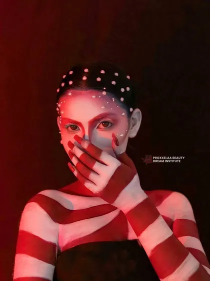 A mysterious and artistic look with bold red and white stripes and delicate pearl accents. This is an example of my avant-garde and conceptual work.