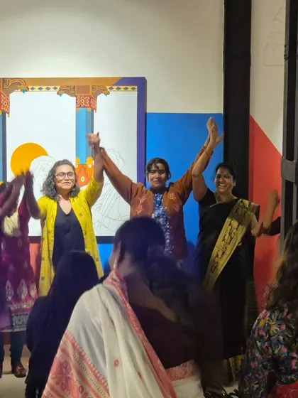 Hands raised in celebration. This is the culmination of our work: not just creating art, but creating joy, confidence, and a community that lifts each other up.