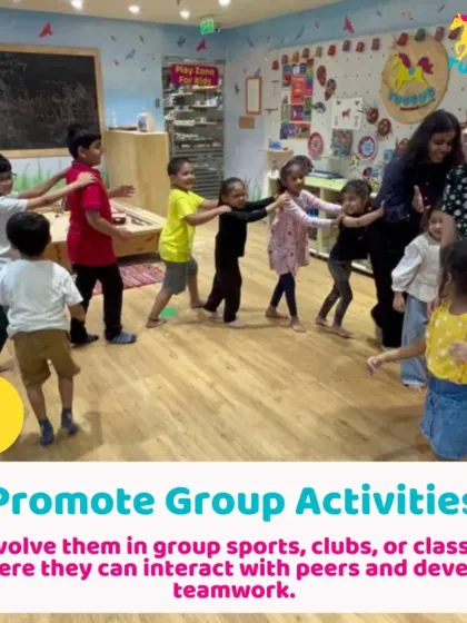 Promoting group activities like this "train" game is key to social development. Children learn to work together and coordinate their movements, all while having fun.