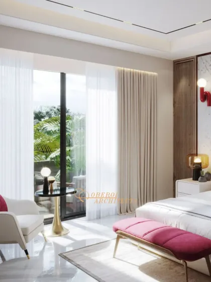 The room is filled with natural light from the large window, which offers a view of the garden and creates a bright, airy feel.