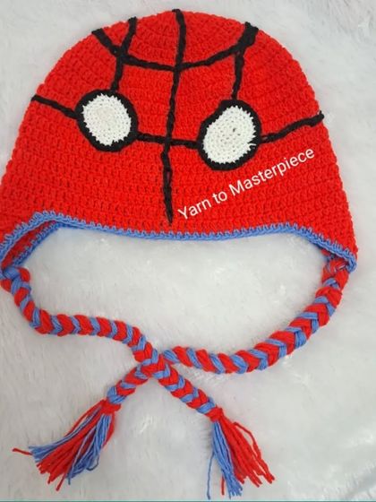 A classic Spider-Man beanie with ear flaps and braided tassels, this hat is both fun and functional, keeping little ears warm.