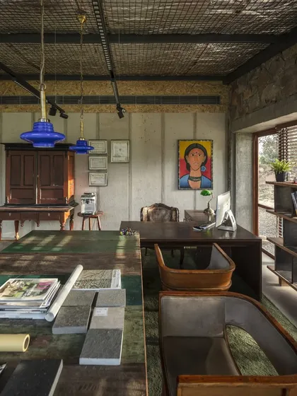 The interior of our studio features an eclectic mix of materials and furniture, including pieces from our own workshop. The space is designed to be a living moodboard, a place for creativity, collaboration, and conversation.