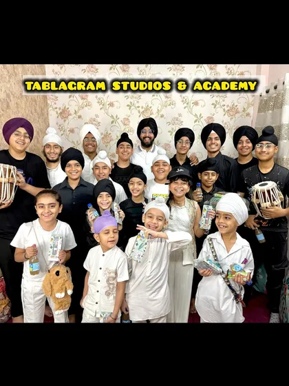 A group photo of the Tablagram Studios & Academy family. This picture captures the diverse age group of my students, all united by their love for percussion and music.
