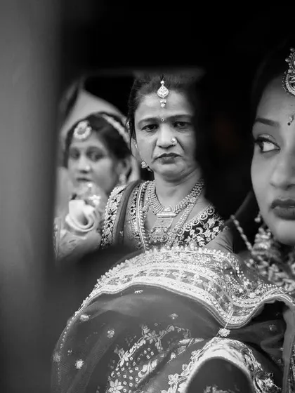 The Bidai is one of the most emotional parts of a wedding. I use an artistic, candid approach to capture these powerful, unscripted moments, creating timeless black and white frames that hold a lifetime of feeling.