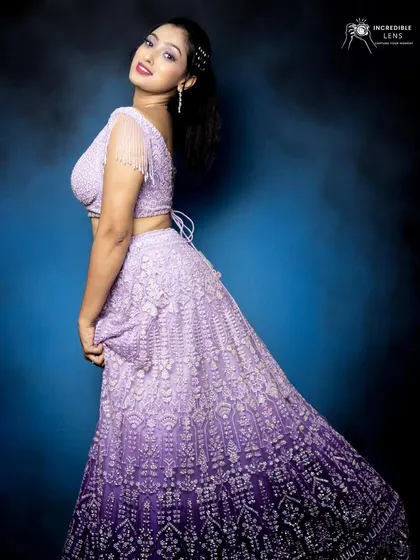 A happy and confident pose. This look is perfect for a bridesmaid or a bride who wants a non-traditional colour for her sangeet.