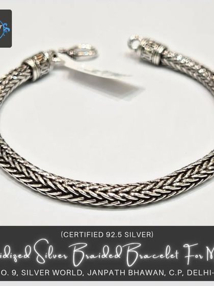 A variation of our braided bracelet, this design features a rounded profile. It's crafted from pure 92.5 silver and oxidized for a rugged, antique appearance.