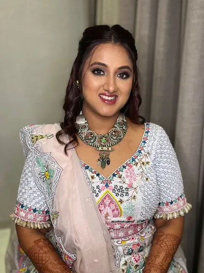 A beautiful smile from my client. This look features a shimmery silver eye and a soft pink lip, perfect for a fun and festive event.