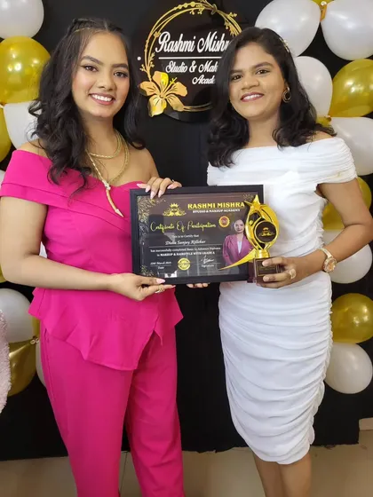 Presenting a certificate to another one of my shining stars. Her hard work and passion for nail art were evident in every class.