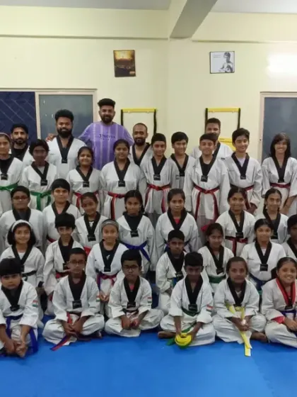 A group of our dedicated students after receiving their new belts. Each belt represents a new level of skill and understanding.