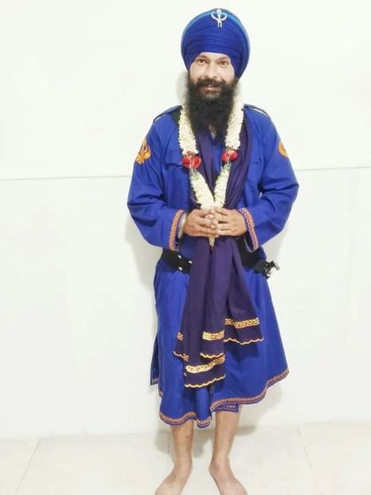 A photo of me in traditional Nihang attire. I am deeply connected to my roots and feel blessed by my Guru's grace.