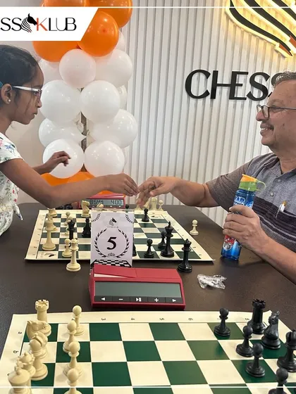 A friendly game between generations at our new center. Chess is a wonderful way to connect people, and our tournaments often bring together players from diverse backgrounds.