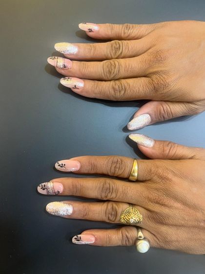 Another view of this sophisticated, abstract nail art, perfect for a client who wants something unique and artistic.