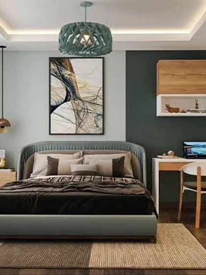A bedroom that perfectly integrates a study area. The design includes a bed with a custom headboard, a compact desk, and an open bookshelf for a functional and stylish setup.