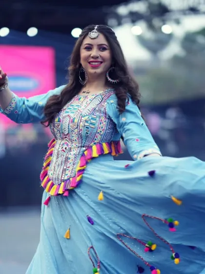 A dynamic shot of me in motion, with the colorful outfit adding to the festive vibe.