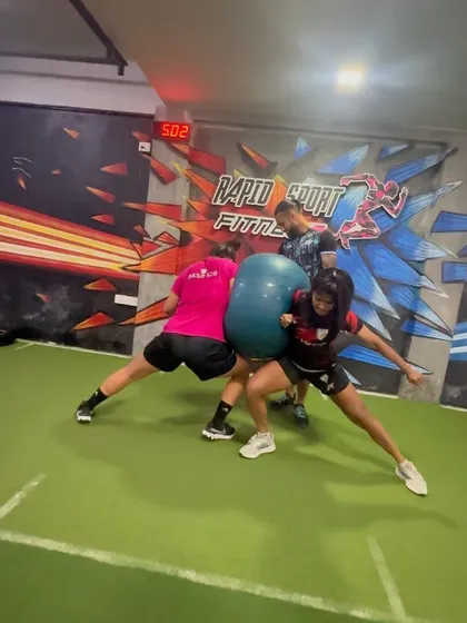 A fun but challenging partner drill using a stability ball to build core and leg strength.