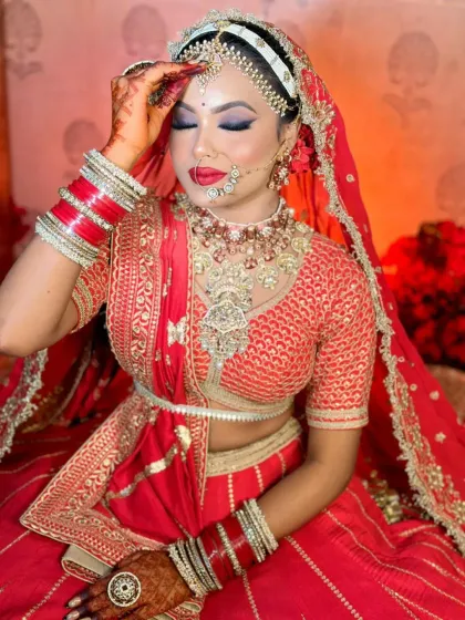 Capturing the perfect bridal portrait is part of the job. This look features a classic red lip and winged liner, a go-to combination for North Indian brides that you will learn to perfect.