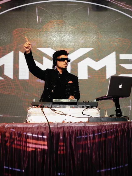 Pointing to the sky, feeling the energy from the crowd. A great DJ set is a two-way street, and I feed off the vibe of the dance floor to deliver the perfect next track.