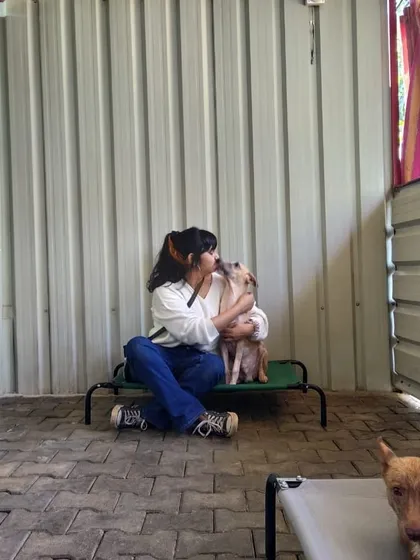 Sharing a quiet, affectionate moment with a shelter dog. These dogs have so much love to give.