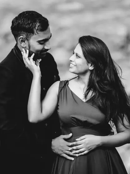 An intimate portrait of Babita and Chetan. The black and white conversion draws all attention to their loving gaze and gentle touch.