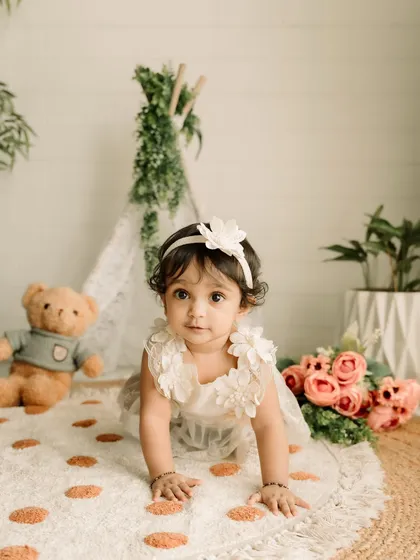 A crawling shot is a must for this age! Capturing them on the move in a beautiful, safe studio environment.