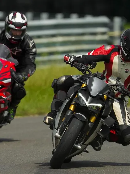 A Ducati Streetfighter V4 being chased by an Aprilia RS 660. Our track days bring out some of the most exotic machines.