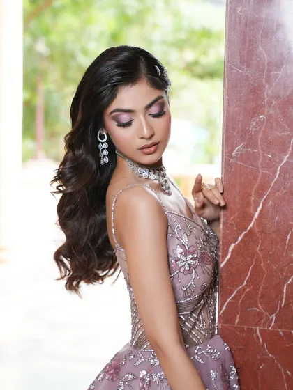 This enchanting look was all about soft, dreamy glamour. I used shades of lilac and pink on the eyes to create a watercolor effect, paired with luminous skin. This style is perfect for festive campaigns or brands that want to convey a sense of romance and elegance.