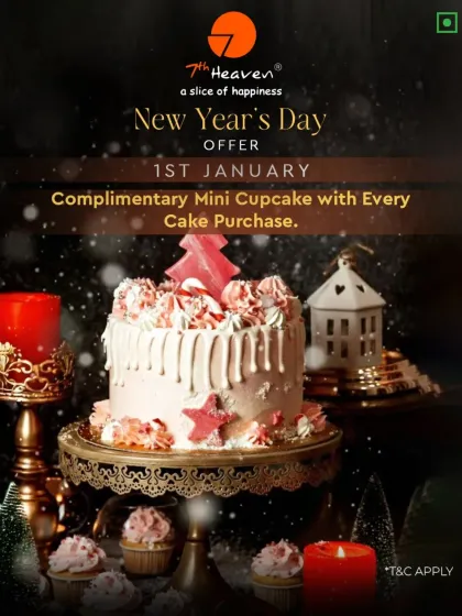 A sweet start to the new year. This beautiful pink drip cake with a Christmas tree topper is part of our special offer, which includes a complimentary mini cupcake.