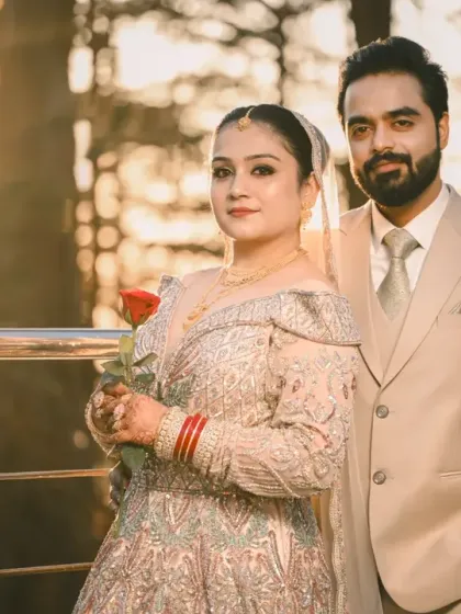 A golden hour portrait where the couple looks directly at the camera. This shot combines the beautiful mountain light with a classic, engaging portrait style.