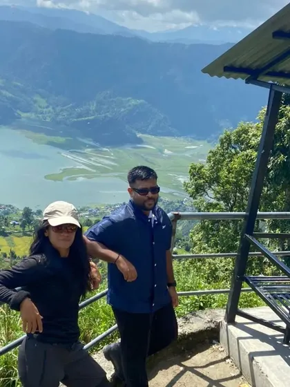 Taking in the breathtaking views of a lake from a viewpoint along our Nepal trekking route.