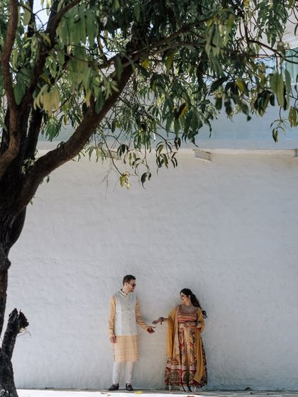 A collection of portraits from a beautiful Haldi photoshoot. I coordinate with the photo team to capture a variety of shots, from romantic close-ups and playful kisses to stylish individual portraits, all within a cohesive, sun-drenched theme.