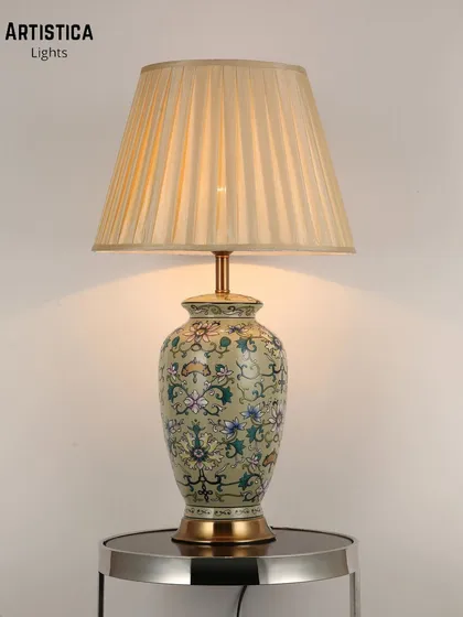 Our commitment to craftsmanship is showcased in this ceramic table lamp. The base is adorned with a hand-painted floral design, making each lamp a unique piece of functional art that brings a touch of heritage and charm to your decor.