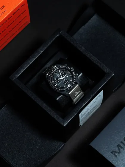 The full package for the "Mission to Mercury." We source these watches complete with their original space-themed box and all accompanying papers.