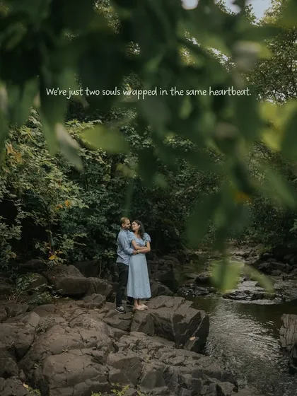 "We're just two souls wrapped in the same heartbeat." A beautifully framed shot of the couple surrounded by lush foliage, creating a sense of a hidden, private world.