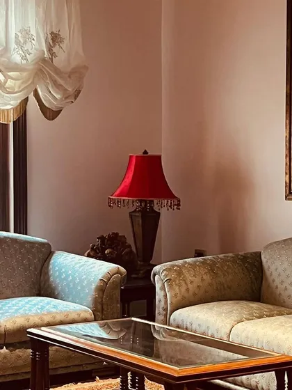 I found this vintage red lamp on a sourcing trip, and it now adds the perfect pop of color to a client's den. Sourcing unique pieces that can elevate a corner is a major and joyful part of my job.