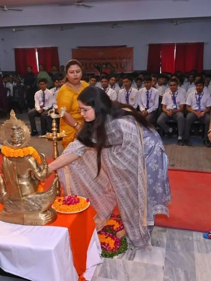 Seeking blessings before starting my address to the students. It is important to stay grounded in our values while aiming for the sky.