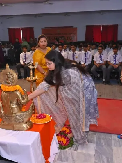 Beginning a session with the traditional lighting of the lamp, seeking blessings for an enriching discussion.