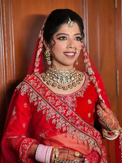 A close-up shot focusing on the intricate details of the jewellery and the flawless makeup.
