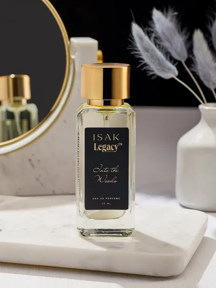 A lifestyle shot for Isak Legacy fragrances. We created a clean, elegant vanity scene with marble, a mirror, and soft florals. This places the product in a real-world context, telling a story of daily ritual and personal style.