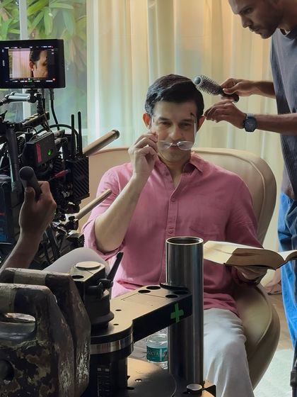 A candid moment of getting my makeup done. Being comfortable in the makeup chair is part of the job, especially on long days with 5 AM call times.