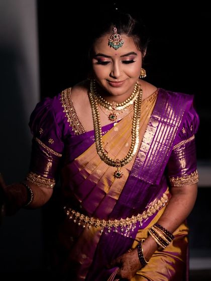 A soft, elegant portrait of Varshini. The makeup enhances her features beautifully.