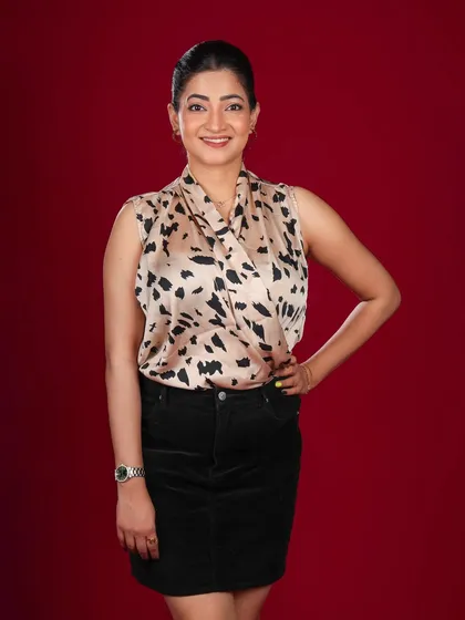 A classic full-length portrait with a confident smile. It's a versatile shot that works for both corporate and commercial portfolios.