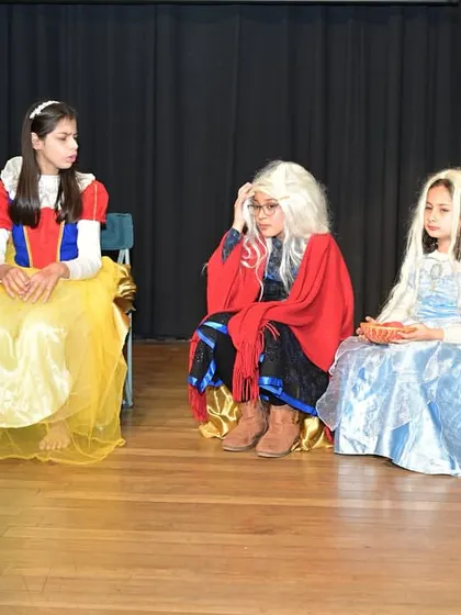 Three fairytale characters in discussion. This highlights the development of dialogue, listening skills, and character relationships.