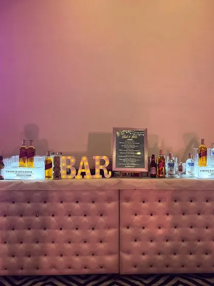 This is our elegant pink tufted bar, a popular choice for stylish weddings and sangeets. We customize our bar setups to perfectly match your event's theme and decor, creating a beautiful centerpiece for your celebration.