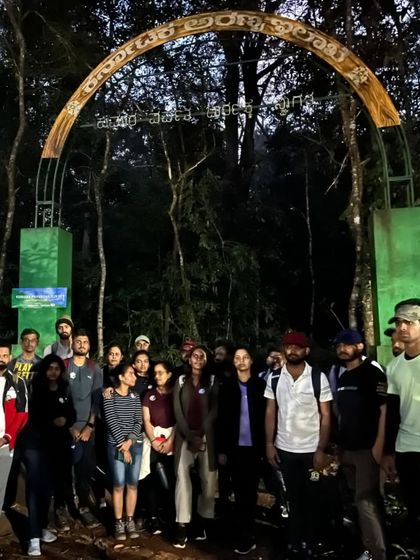 The group at the forest department archway, the official start of the Kumara Parvatha trek from the Kukke side.