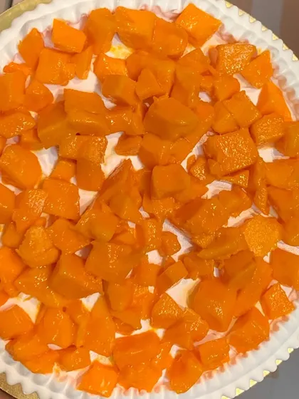 A close-up of the delicious mango filling we use in our cakes, made with real, high-quality mangoes.