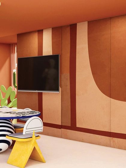 The wall behind the dining table features a colorful, abstract mural, adding another layer of artistic expression to the space.