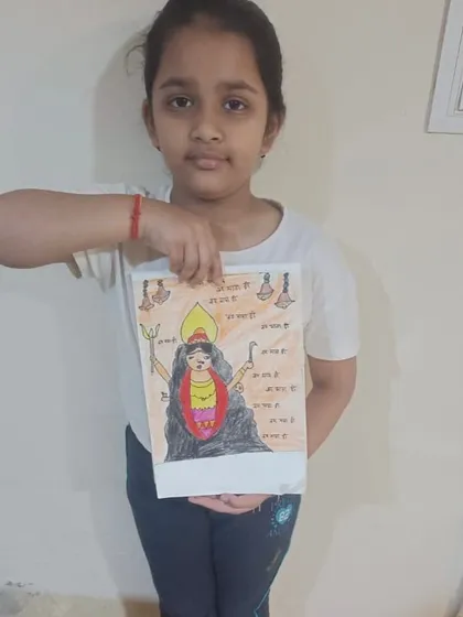 A young student proudly displays her drawing for Ram Navmi. We love celebrating festivals through art, helping children connect with cultural stories in a creative way.