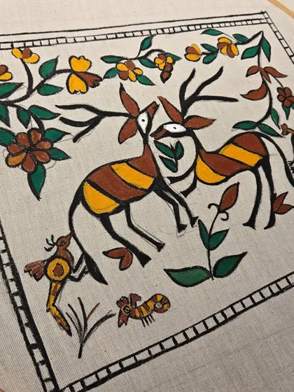 This fabric painting is inspired by the traditional Sohrai folk art style. Our workshops explore various regional art forms, teaching you how to adapt their unique motifs onto different surfaces like cloth.